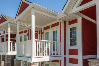 a row of houses with balconies on them at Country Club Charm - 4-Bed Radiant Resort Condo in Edgar