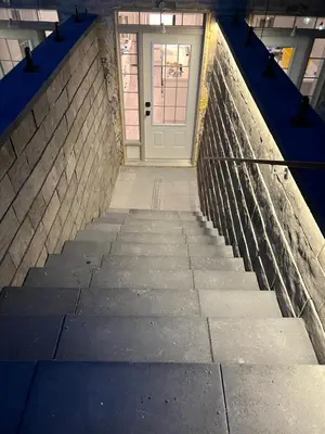 a stairway leading to a door in a building at The Croft House - 2 Bedroom 1 Bathroom Suite in Burlington