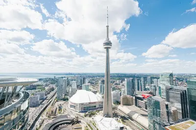 a view of the cn tower in toronto at Beautiful Luxurious Modern Condo With Breathtaking Views in Toronto
