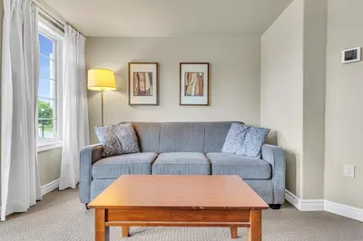 a living room with a couch and a coffee table at Quite in Nature in Edgar