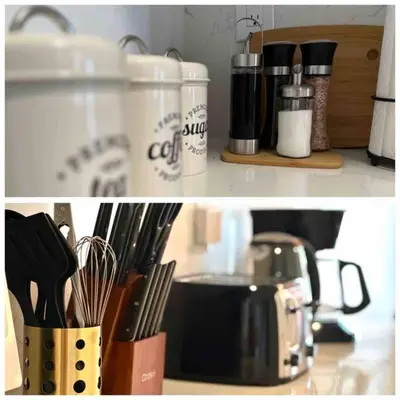 a kitchen counter with utensils and a coffee maker at Charming Home in Prime Location North of Toronto in Richmond Hill