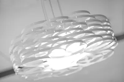 a glass chandelier hanging from a ceiling at Liberty Suites in Thornhill