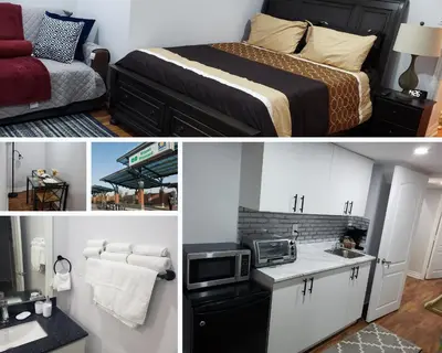 a bedroom with a bed and a sink and a microwave at Luxurious 1BR - 1BA Apt Modern Bright with free parking-pc in Brampton