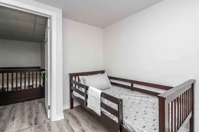 a bedroom with a bunk bed in a room at Farm House in Coldwater