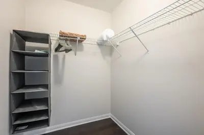 a closet with a ladder and shoes on the wall at GlobalStay 3 Bedroom House with Parking Brampton in Brampton