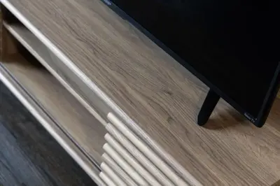 a wooden dresser with a black table with a drawer at City Serenity 1 Bedroom with Balcony in Toronto