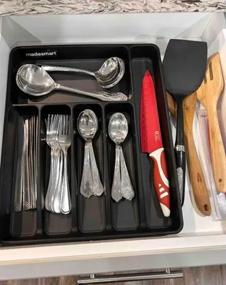 a black tray with utensils in a drawer at Walk-out Basement Apartment with Private Entrance in Brampton