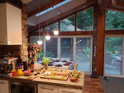 a kitchen with a counter with food on it at Anthropocene Jewel Cottage in Milton