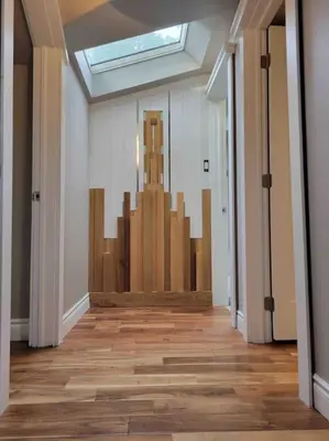 a hallway with a skylight in a building at Anthropocene Jewel Cottage in Milton