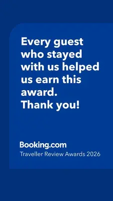 a blue picture with the words every guest who stayed with us helped us earn this at Exquisite, Bright & Modern Condo - Free Parking in Niagara Falls