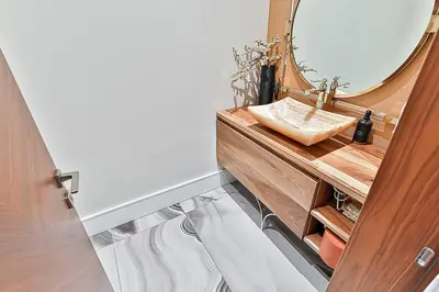 a bathroom with a sink and a mirror at Luxurious Spa Retreat - Toronto Escape in Toronto