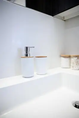 a kitchen counter with a sink and a faucet at Chic 1-BR Condo; Parking included; Downtown Core in Toronto