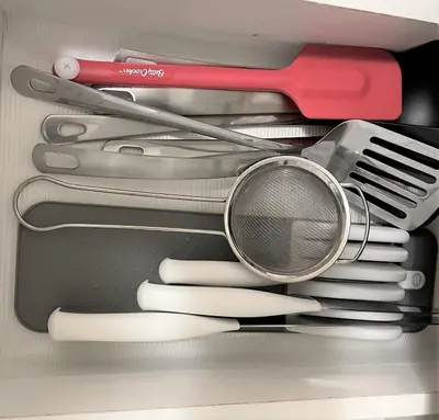 a drawer filled with kitchen utensils and a comb at Cozy Lovely Ravine facing Suite. in Mississauga