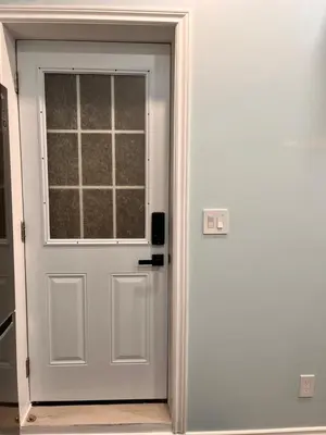 a white door with a window in a room at Private Apartment/Suite in Whitby