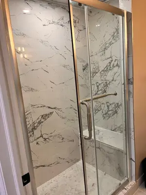 a shower with a glass door in a bathroom at Private Apartment/Suite in Whitby