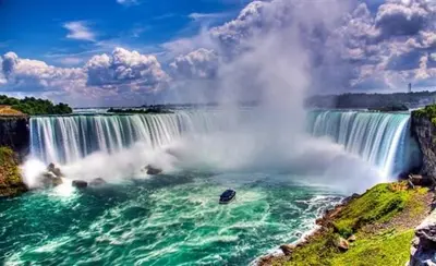 a view of a waterfall in front of a river at Vacation paradise in St. Catharines