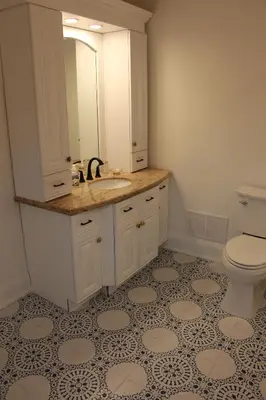 a bathroom with a sink and a toilet at 4 Guest Suite with Waterfront Views at Fancie's PEC - Suite 2 in Belleville