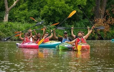 a group of people in kayaks in the water at Charming Bloor West Retreat in Toronto