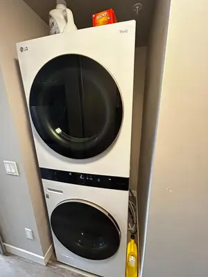 a microwave oven sitting inside of a wall at 1-bedroom condo near University of Waterloo in Waterloo