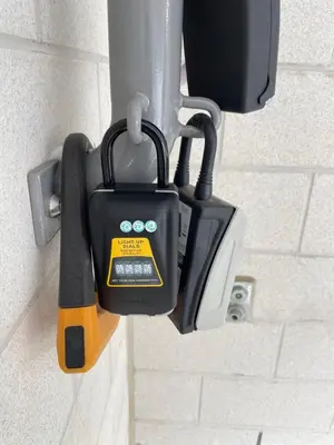 astrument hanging on a wall with a knife at 1-bedroom condo near University of Waterloo in Waterloo