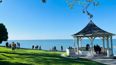 people standing around a gazebo on the beach at Barker House 3# Suite-heart of oldtown in Niagara on the Lake