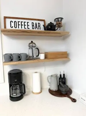 a coffee bar sign on a shelf in a kitchen at Waterfront Haliburton, All Season, Fully Equipped Cottage! in Haliburton