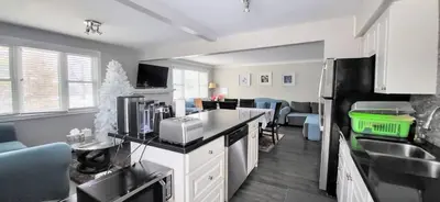 a kitchen with a sink and a counter top at Cozy Home in Niagara-on-the-Lake in Niagara on the Lake
