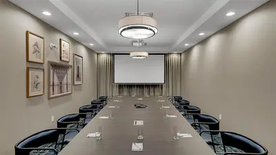 a long conference room with a long table and chairs at Hampton Inn & Suites by Hilton Toronto Markham in Markham