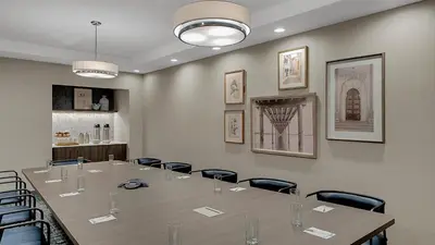 a conference room with a long table and chairs at Hampton Inn & Suites by Hilton Toronto Markham in Markham