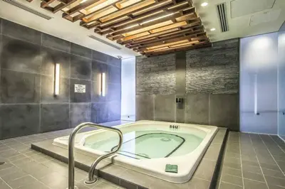 a bathroom with a bath tub in a room at CN lovers in Toronto