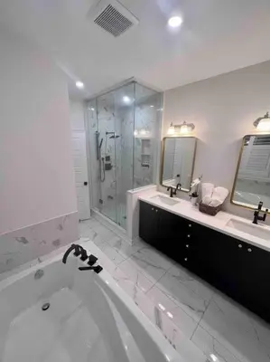 a white bathroom with a tub and a shower at Luxury Oakville Home, Hot Tub, Fireplace, New Home in Oakville