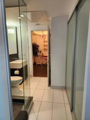 a bathroom with a toilet and a sink at Chic 1BDR Loft with Office Space-Heart of Toronto in Toronto