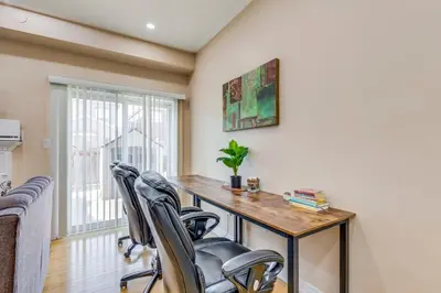 a home office with a wooden table and chairs at Avid vacation palace in Castlemore , Brampton in Brampton