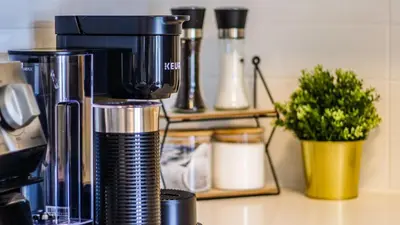 a coffee maker sitting on top of a counter at 2br Boho Townhouse - Walk To Falls, Free Parking in Niagara Falls