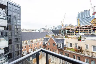 a view of a city from a balcony at DWTN Condo Near CN Tower! w/ Free Parking in Toronto