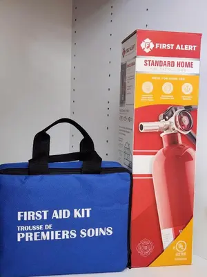 a box of the first aid kit for primers sinners sons at The Serene Haven Modern 2 Queen Bed Full Apartment in St. Catharines