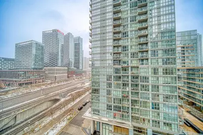 a view of a tall building in a city at The Snug 1plus1 Suite with Free Parking in Toronto