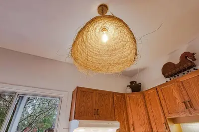 a light hanging from the ceiling of a kitchen at Exquisite Luxury Estate - Steps to Downtown in Toronto