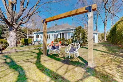 a swing set in the yard of a house at 2889 Purvis Street in Innisfil