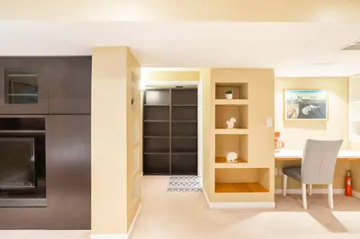 a kitchen and dining room with a table and chairs at Cozy basement apartment in Newmarket in Newmarket