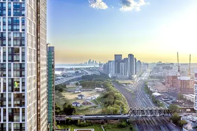 a view of a city with tall buildings at SkyHigh Haven LED-Lit Downtown Condo Retreat in Toronto