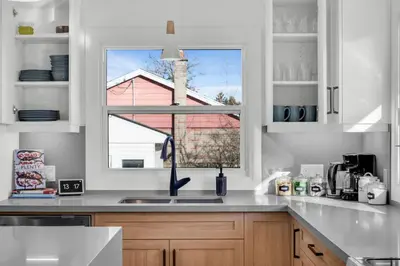 a kitchen with a sink and a window at Luxury Family Home in Burlington in Burlington