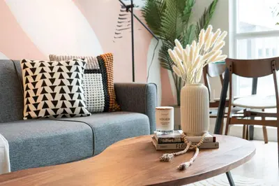 a living room with a couch and a coffee table at Stylish Downtown Toronto Suite with Free Parking in Toronto