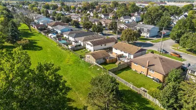 an aerial view of a residential neighborhood with houses at The Garden Retreat in Welland, On - 1BR,Free Parking and Workspace in Welland