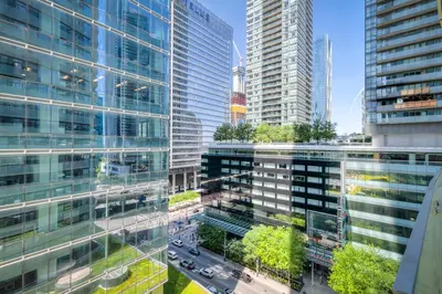 an aerial view of a city with tall buildings at RivetStays - The York in Toronto