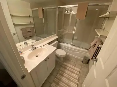 a bathroom with a sink and a shower and a toilet at Alaa Aldahhan in Mississauga