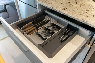 a drawer in a kitchen with utensils in it at RentX Downtown 2-Bed Suite Gym WiFi in Toronto