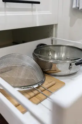 a pan and pans sitting on top of a stove at Elegant & Private Apartment - Short Walk From Downtown in London