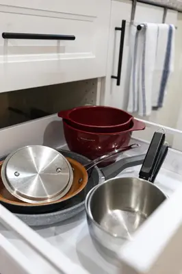 a kitchen counter with two pans and a bowl at Elegant & Private Apartment - Short Walk From Downtown in London