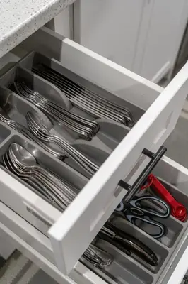 a drawer filled with silver utensils in a kitchen at Haven Suite in London, On 2Br, 1Bath with free washer and dryer in London